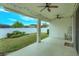 Covered patio with ceiling fans and backyard view at 2232 Donahue Dr, Ocoee, FL 34761