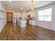 Modern kitchen with white cabinets, island and stainless steel appliances at 2232 Donahue Dr, Ocoee, FL 34761