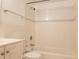 Clean bathroom with a shower/tub combo and white vanity at 257 Scottsdale Sq # 257, Winter Park, FL 32792