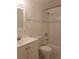 Clean bathroom with tub, toilet and white vanity at 257 Scottsdale Sq # 257, Winter Park, FL 32792