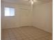 Spacious bedroom with tile floors and double door closet at 257 Scottsdale Sq # 257, Winter Park, FL 32792