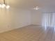 Bright living room with tile floors and sliding door access at 257 Scottsdale Sq # 257, Winter Park, FL 32792