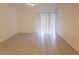 Bright living room featuring tile floors and sliding glass doors at 257 Scottsdale Sq # 257, Winter Park, FL 32792