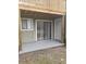 Private patio with sliding glass doors and wooden deck at 257 Scottsdale Sq # 257, Winter Park, FL 32792