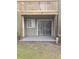 Private patio with sliding glass doors and wooden deck at 257 Scottsdale Sq # 257, Winter Park, FL 32792