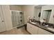 Bathroom boasts a double vanity and a large walk-in shower at 3033 Timber Hawk Cir, Ocoee, FL 34761
