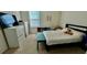 bedroom with full-size bed, TV, and plenty of storage at 3033 Timber Hawk Cir, Ocoee, FL 34761