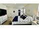 Bright bedroom with a comfortable bed and plenty of closet space at 3033 Timber Hawk Cir, Ocoee, FL 34761
