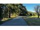 Paved community path through trees at 3033 Timber Hawk Cir, Ocoee, FL 34761
