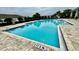Community swimming pool with deck at 3033 Timber Hawk Cir, Ocoee, FL 34761