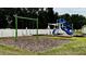 Community playground with swings and playset at 3033 Timber Hawk Cir, Ocoee, FL 34761