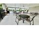 Community pool area with covered seating and tables at 3033 Timber Hawk Cir, Ocoee, FL 34761