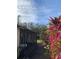 Backyard with screened porch and plants at 310 Blue Jacket Ln, Orlando, FL 32825