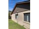 Side of house with windows and siding at 310 Blue Jacket Ln, Orlando, FL 32825