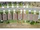 Aerial view of a residential neighborhood showcasing a home with a screened in lanai at 351 Lazio Cir, Debary, FL 32713