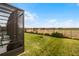 Expansive grassy backyard with a view beyond the fence at 351 Lazio Cir, Debary, FL 32713