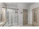 Clean bathroom with shower and linen closet at 351 Lazio Cir, Debary, FL 32713