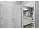 Bathroom with granite countertop and shower at 351 Lazio Cir, Debary, FL 32713