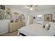 Comfortable bedroom with dresser and en-suite bathroom at 351 Lazio Cir, Debary, FL 32713