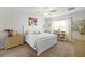 Spacious bedroom with a king-size bed and ample storage at 351 Lazio Cir, Debary, FL 32713