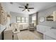 Bright Bedroom with crib, armchair, and ample storage at 351 Lazio Cir, Debary, FL 32713