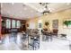 The clubhouse features tables and chairs and a bar, perfect for relaxing and socializing with neighbors at 351 Lazio Cir, Debary, FL 32713