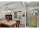 Bright dining room featuring a table, chairs, and a display cabinet at 351 Lazio Cir, Debary, FL 32713
