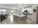 Open concept kitchen with a large island and access to the Gathering room at 351 Lazio Cir, Debary, FL 32713