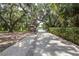 Lakeside community featuring a boat launch and scenic tree coverage at 351 Lazio Cir, Debary, FL 32713
