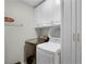 Laundry room with washer, dryer, and cabinets at 351 Lazio Cir, Debary, FL 32713
