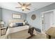 King-size bed in main bedroom with ensuite access at 351 Lazio Cir, Debary, FL 32713