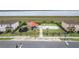Community playground featuring play structures, a gazebo, and a fenced perimeter for safety and fun at 351 Lazio Cir, Debary, FL 32713