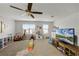 Fun playroom with toys, TV, and a giraffe toy at 351 Lazio Cir, Debary, FL 32713
