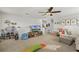 Playroom with TV, toys, and ample space for  at 351 Lazio Cir, Debary, FL 32713
