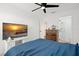 Serene bedroom with blue bedding and ensuite bathroom access at 488 W Par St # 4, Orlando, FL 32804