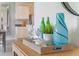 Elegant tray with wine glasses, sparkling water, and decor at 5071 Tana Ter, St Cloud, FL 34772