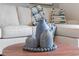 Living room boasts a stylish coffee table with decorative vases at 5071 Tana Ter, St Cloud, FL 34772