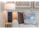 Beige couch with blue pillows and throw blanket in the living room at 5071 Tana Ter, St Cloud, FL 34772