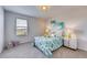 Charming bedroom with unique bedding and window at 5080 Tana Ter, St Cloud, FL 34772