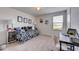 Bedroom with daybed, window, and workspace at 5080 Tana Ter, St Cloud, FL 34772