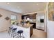Modern kitchen with stainless steel appliances and granite countertops at 5080 Tana Ter, St Cloud, FL 34772