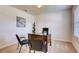 Bright home office featuring a desk and two chairs at 5080 Tana Ter, St Cloud, FL 34772