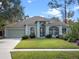 Charming one-story home with a well-manicured lawn at 5085 Blacknell Ln, Sanford, FL 32771