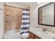 Clean bathroom with shower/tub combo and a granite vanity at 675 Overspin Dr, Winter Park, FL 32789
