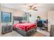 Bedroom with a bed, built-in desk and plenty of closet space at 675 Overspin Dr, Winter Park, FL 32789