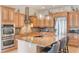 Modern kitchen with granite countertops and stainless steel appliances at 675 Overspin Dr, Winter Park, FL 32789
