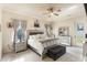 Main bedroom with king-size bed and access to backyard at 675 Overspin Dr, Winter Park, FL 32789