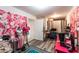 Bright office space with a large floral wall accent at 675 Overspin Dr, Winter Park, FL 32789