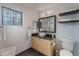 Modern bathroom with floating vanity and black accents at 711 Centervale Dr # 711, Celebration, FL 34747
