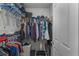 Large walk-in closet with ample hanging and shelving space at 711 Centervale Dr # 711, Celebration, FL 34747